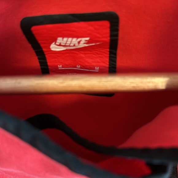 Bright red, hi/low zip up with hood. Zipper is off to the side. - Picture 2 of 3